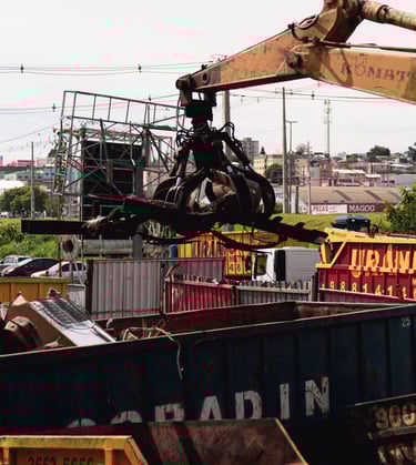 a craned craned over a pile of junk