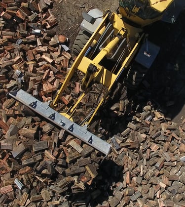 Loader bucket with firewood