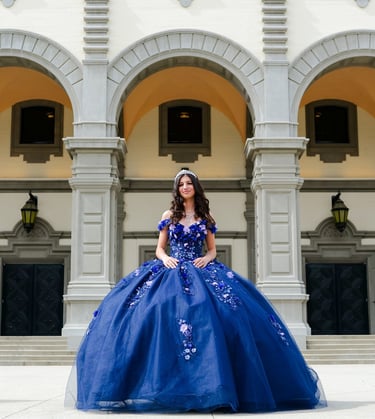 a Qunice in a blue dress sitting on a staircase