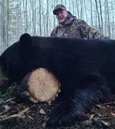 Saskatchewan black bear hunts - 419 lb black bear with hunter