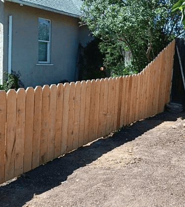 a fenced in yard with a fenced in area