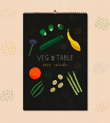 An A4 calendar is mocked up on a patterned background.