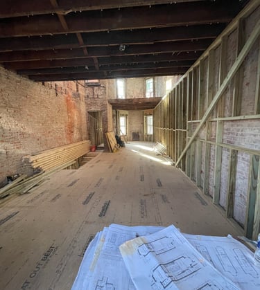 a room with a lot of floor plans and a lot of flooring