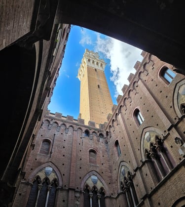 a clock tower in a building with a sky view