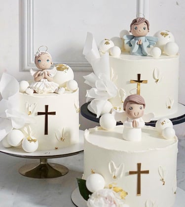a couple of cakes with angels on them