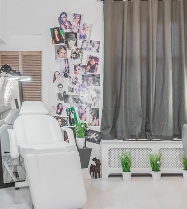a salon and beauty salon with a chair and a chair