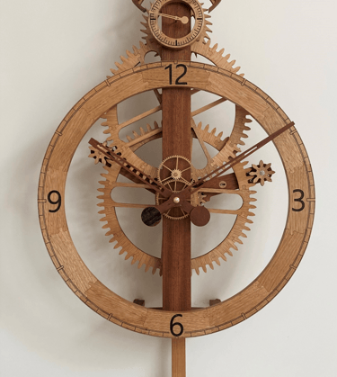 A wooden clock made from recycled timber. Wooden gears. Jigsaw joints. Reclaimed