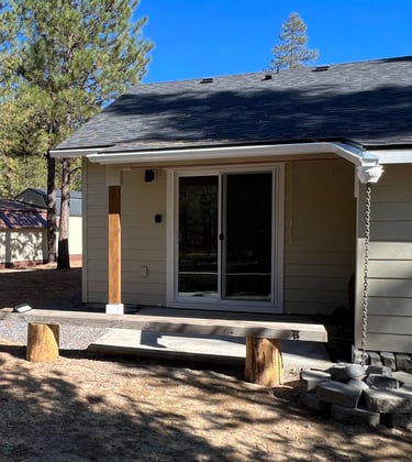 entrance to guest suite and a bench in the background