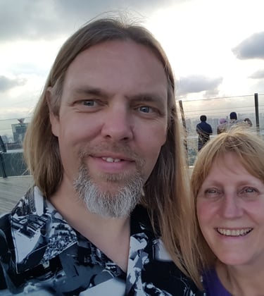 Sean and Patsy in a selfie photo in Singapore
