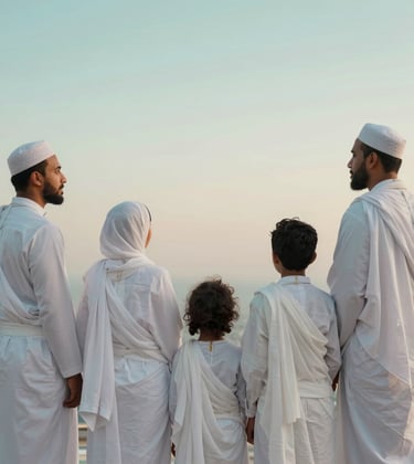 An aspirational shot of a family of International / Global Muslim pilgrims standing together, looking towards a beautiful horizon. They are dressed in white Ihram and modest clothing. The lighting is warm and reassuring, using a palette of soft teals and whites.