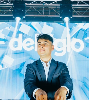 a man in a suit and tie is playing the dj - zil