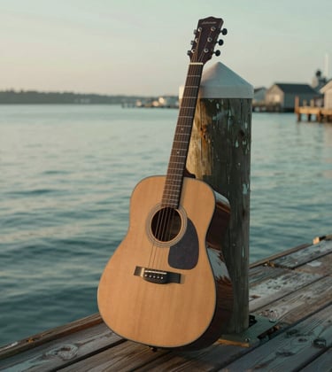 A refined, authentic photograph of a vintage acoustic guitar leaning against a salt-worn wooden dock in a North American / Coastal harbor. The muted sea green of the water provides a serene backdrop under the soft, diffused light of a coastal morning.