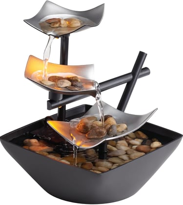 Indoor tabletop water fountain with cascading water, natural river rocks and LED lights for calming home or office decor