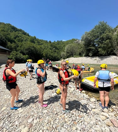 Guests preparing for their rafting experience on the Neretva River