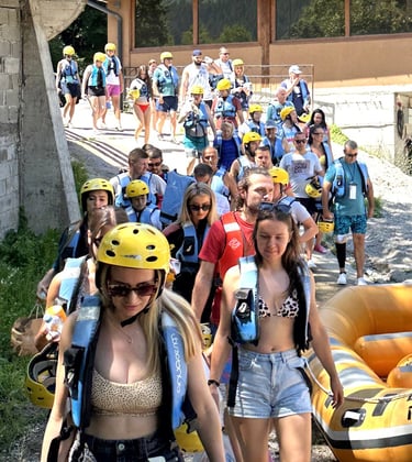 Rafting Neretva guests coming down the hill to enjoy thrilling experience of rafting on Neretva