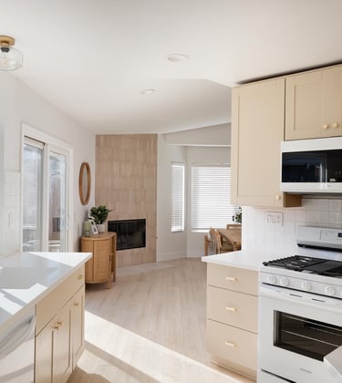 a kitchen with a stove top oven and a microwave