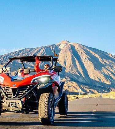 a person riding a quad - bike on a road