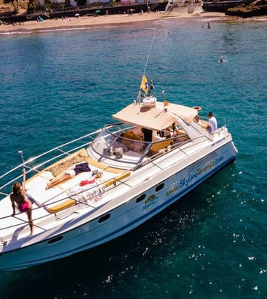 a boat with people on it in the water
