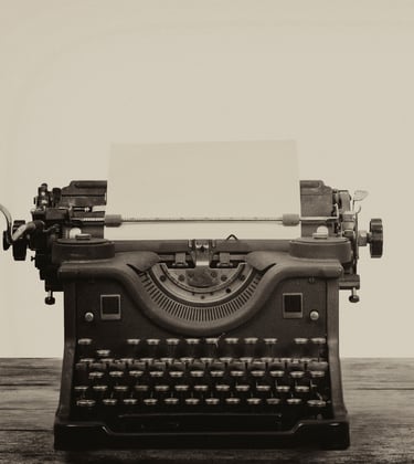 Antique typewriter with script page, symbolizing original screenwriting.