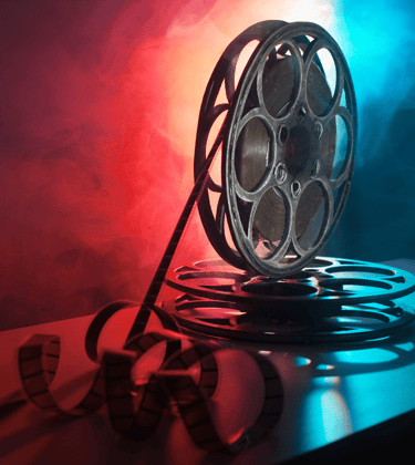 Vintage film reels showcasing hybrid creative services.