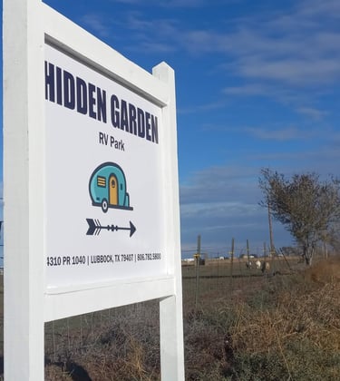 Hidden Garden RV Park entrance sign at 4310 Private Road 1040, Lubbock, Texas 79407 - full hook ups