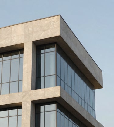 Close-up architectural photography of a modern building's corner featuring clean lines and a glass curtain wall. Middle Eastern / Egyptian context. Palette of light gray and gold highlights under a bright, clear sky. Sophisticated and high-tech feel.