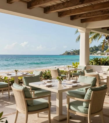 Photography of a serene outdoor dining terrace at a premium property in a Central American / Costa Rican beach town. Elegant cream off-white tables, muted sage green cushions, and a view of the turquoise sea under a clear sky.