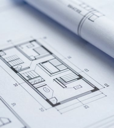 An analytical, clean macro shot of architectural blueprints meeting a digital interface, representing a systematic and operational approach to reform. Includes #94A7B7 tones.