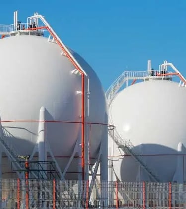 a row of white Gases tanks 