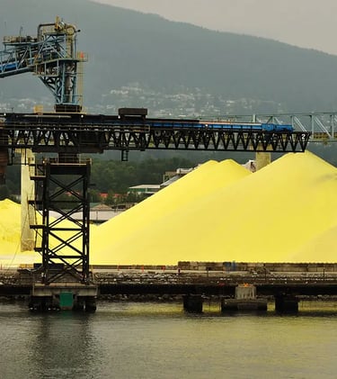 a large pile of yellow Sulphur  & Petrochemicals