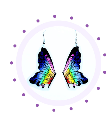 a pair of colorful butterfly earrings with a rainbow colored butterfly