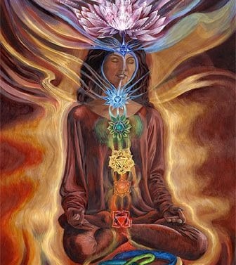 a woman sitting in a lotus flower meditation position
