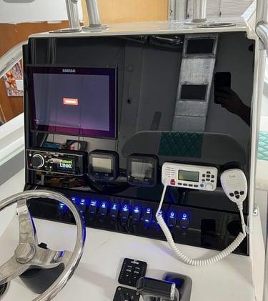 Upgraded boat control station with custom dashboard inlay with new electronics fitted 