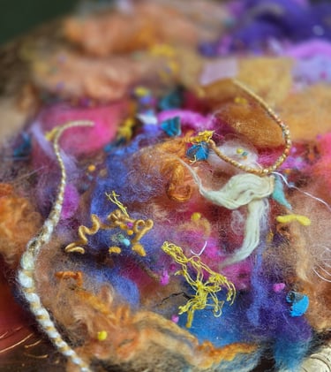 a close up of a piece of artisanned fibers with a needle - tipped