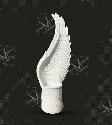 a white angel wing sculpture on a black background