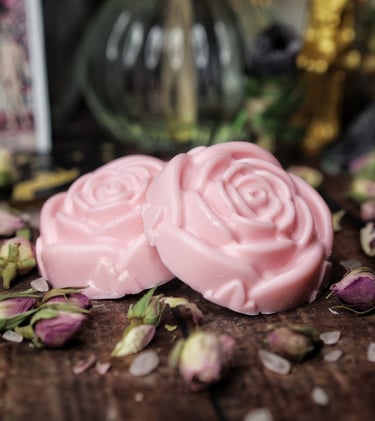 Rose shaped soaps surrounded by miniature roses