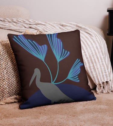 a decorative pillow with a bird on it