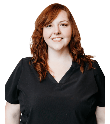 Haylei, massage therapist and owner of Psyche and Soma Wellness in Greenville, SC, smiling