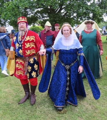 Edward III king of England and France with his wife Queen Philippa of Hainault enter the tournament 