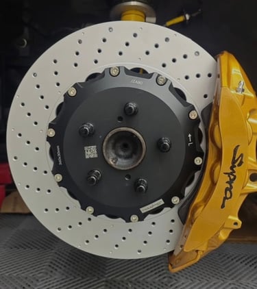 Front Brembo Gold CTSV calipers paired with 360x30mm drilled 2-piece rotors
