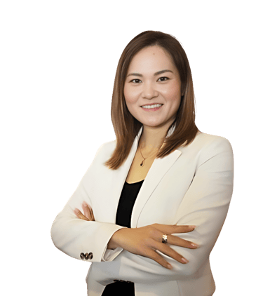 a Japanese woman in a white blazer and black pants