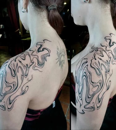 Abstract tattoo on shoulder