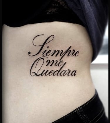 Lettering Tattoo on ribcage