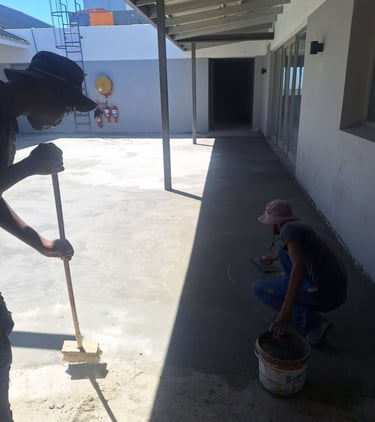 Floating surface area of specialized waterproofing screed application, Harbor Bay Mall, Simon"s Town, Cape Town