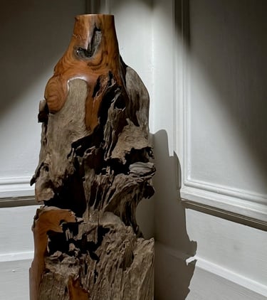 Handcrafted woven bamboo basket with intricate knot details and a sturdy handle for rustic storage.