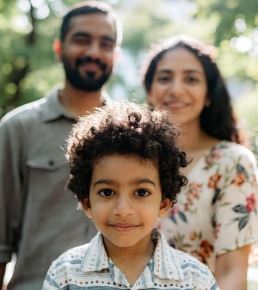 Four year Mexican heritage old boy with his father and mother.