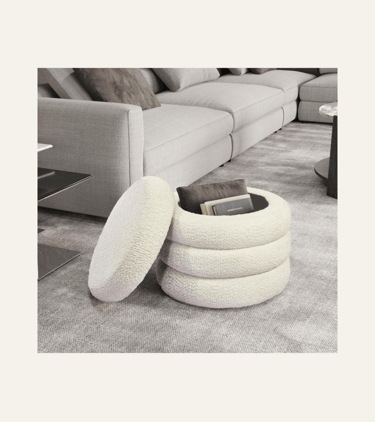 picture of a white boucle ottoman with top resting on the side