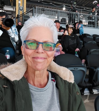 Mrs. M in the stands cheering on her favorite ice hockey team!