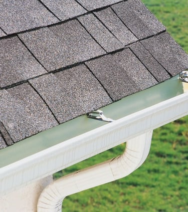 Seamless gutter system installed along residential roofline by Robert Hodges Roofing in Louisville Kentucky