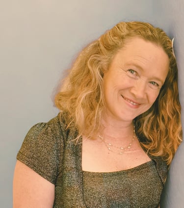 Photo of Maree Gifkins leaning against a wall